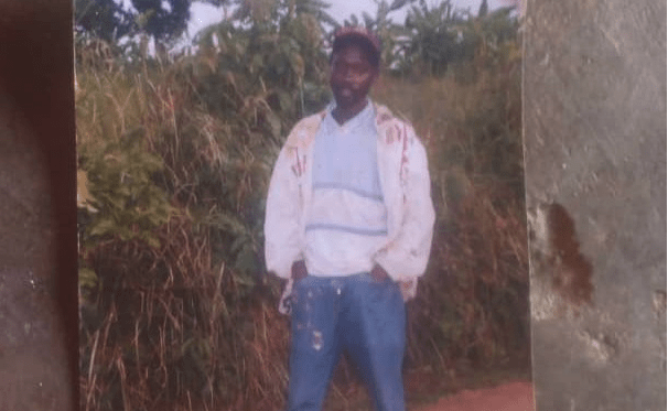 A photo from family album deceased Nzayisenga John. By going to local forest to cut wood, he hoped to bring home money, instead he returned battered, and died later – likely from wounds sustained