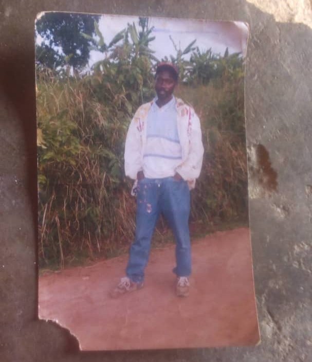 A photo from family album deceased Nzayisenga John. By going to local forest to cut wood, he hoped to bring home money, instead he returned battered, and died later – likely from wounds sustained