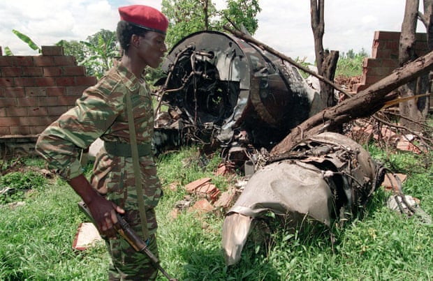 A Rwanda Patriotic Front rebel at the site of the plane crash that killed Rwanda’s president Juvénal Habyarimana in April 1994. Photograph: Jean Marc Boujou/AP